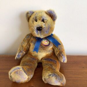 Plush Teddy Bear with Blue Ribbon